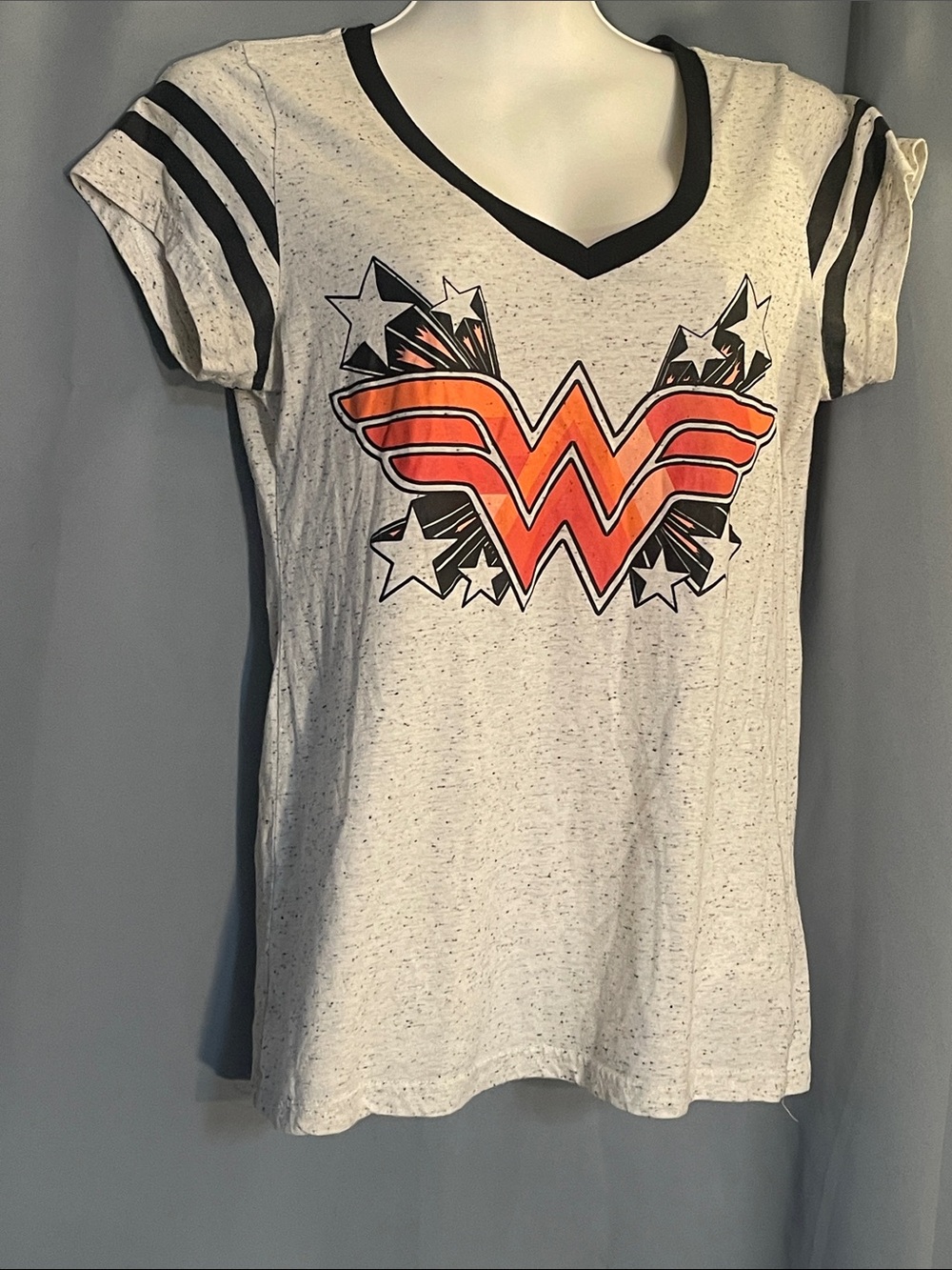 DC Women’s Light Heather V-Neck Tee with Orange Graphic and Black Trim